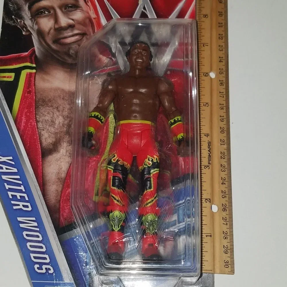 WWE Xavier Woods Action Figure (new toy with noticeable packaging wear) AS IS